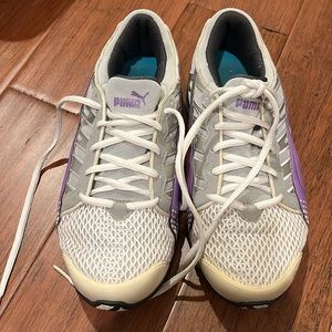 Women’s size 9 purple and white Pumas